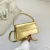 Gold shoulder bag