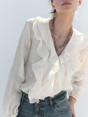 Spring Loose V-Neck Top with Laminated Detail
