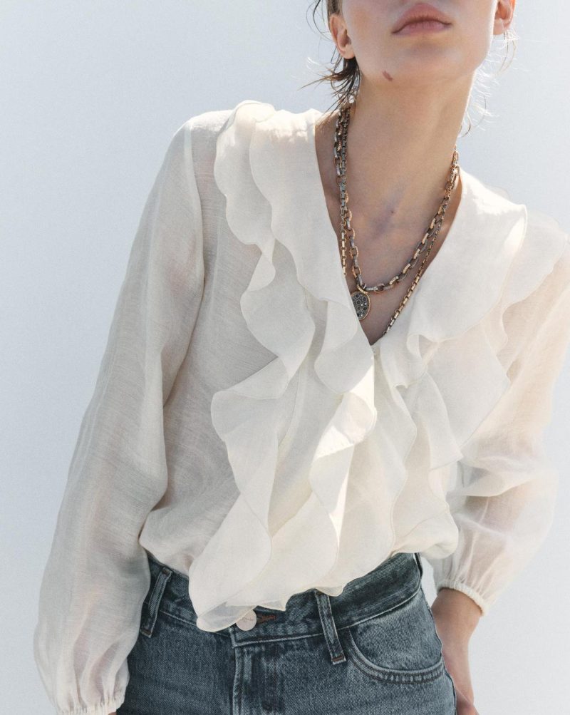 Spring Loose V-Neck Top with Laminated Detail