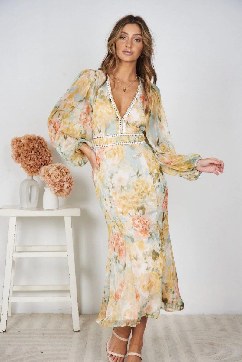 Elegant Printed Long Dress with Dovetail Hem