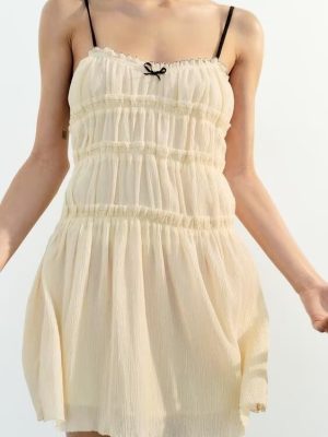 Women’s Textured Dress Featuring Cute Bow Detail