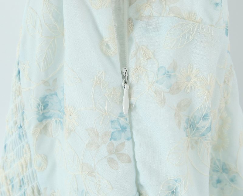 Sleeveless Embroidered Dress with Doll Silhouette - Image 3